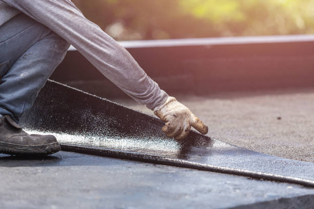 Professional Basement Waterproofing technician working in Ottawa, KS